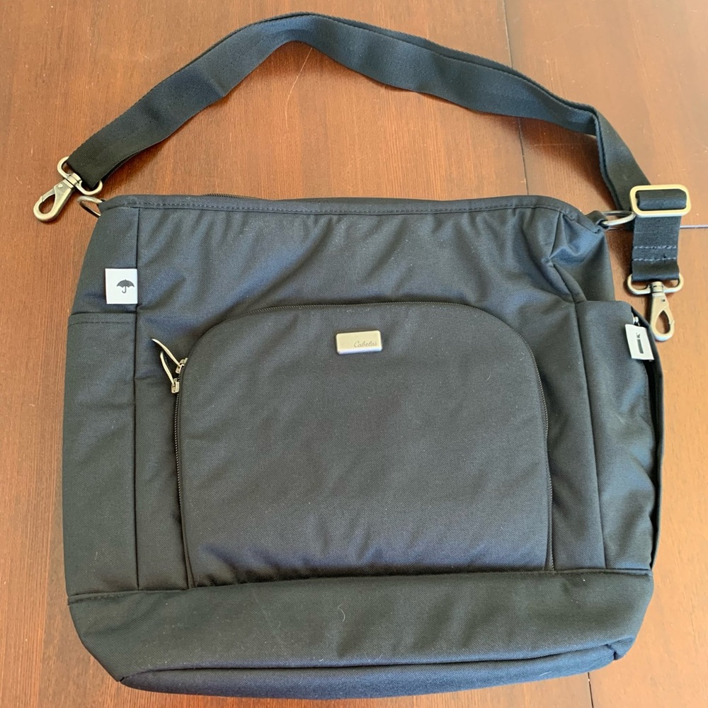 Black Cabela’s tote. Detachable shoulder strap.